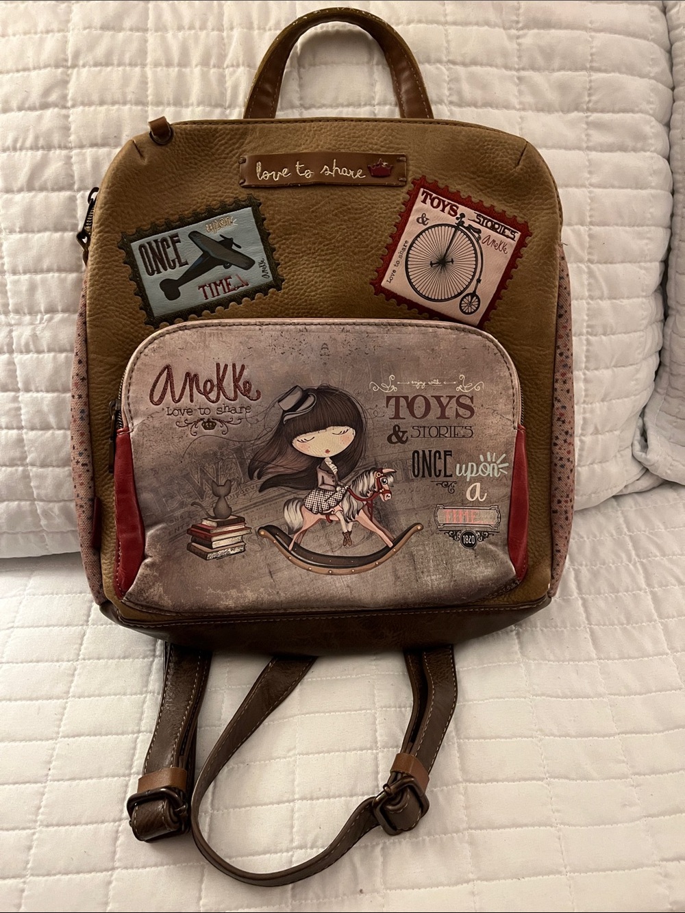 Brown Leatherette Backpack with Illustrated Front Pocket & Travel Patches